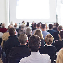 Packed Conference Room with Perspective on the Speaker©kasto / fotolia.com